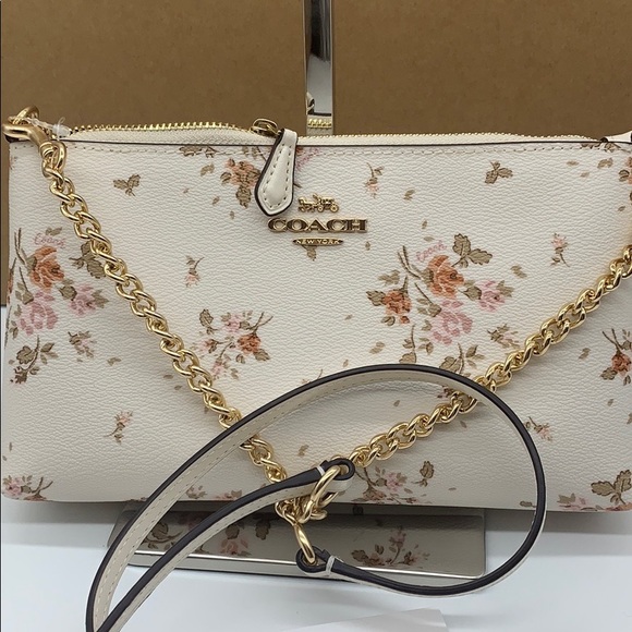 Coach Handbags - COACH ZIP TOP CROSSBODY WITH ROSE BOUQUET PRINT